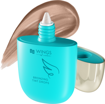 Wings of Color Bronzing Tint Drops w turkusowej butelce z aplikatorem i smugą brązującego tintu.