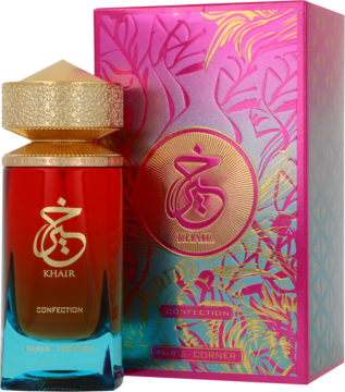 Paris Corner Khair Confection, słodka woda perfumowana. Czerwona butelka z niebieskim dnem, złoty korek, różowe pudełko.