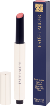 Estée Lauder Pure Color Glowstick w otwartym, beżowym opakowaniu, z widocznym koralowym wkładem, obok granatowe pudełko.