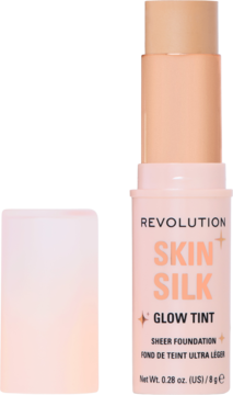 Revolution Skin Silk Glow Tint, beżowy rozświetlający podkład w sztyfcie, widok z przodu z odkręconą zakrętką.
