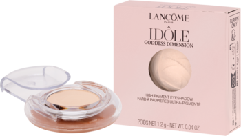 Lancôme Idôle Golden Dimension beżowy cień w otwartym, przezroczystym, okrągłym opakowaniu obok różowego pudełka.