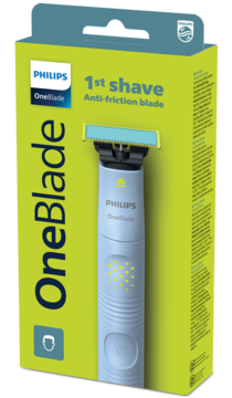 Philips OneBlade 1st shave z ostrzem antytarciowym, w jasnozielonym opakowaniu z widoczną maszynką.