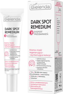 Bielenda DARK SPOT REMEDIUM Kremo-maść na przebarwienia, biała tubka i kartonik obok siebie, widok z przodu.