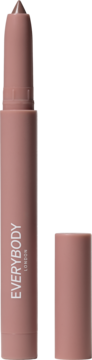 Kredka do ust Everyday Nude w matowej, pudroworóżowej obudowie, z widoczną ostrą końcówką i zdjętą skuwką.
