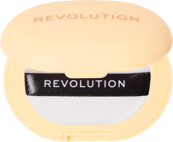 Jasnobrzoskwiniowe, otwarte etui prasowanego pudru Revolution Powder Pops Instant Blur Setting Powder, z czarną gąbeczką.