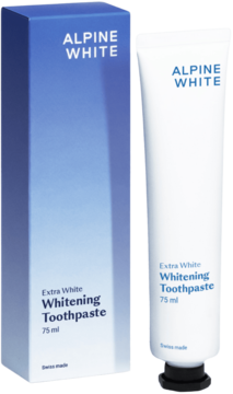Biała tuba i niebieskie pudełko pasty Alpine White Whitening Toothpaste Extra White 75 ml, obok siebie.