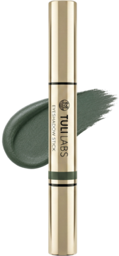 Złoty sztyft TULI LABS EYESHADOW STICK z ciemnozielonym cieniem do powiek i kremowymi smugami.