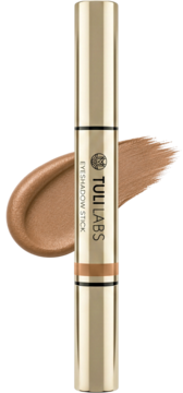 Złoty, kremowy sztyft Tuli Labs Eyeshadow Stick, błyszczący brązowy cień nałożony obok, widok z przodu.