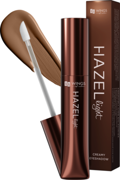 Kremowy cień WINGS HAZEL light w brązowej tubce z aplikatorem i brązowym swatche, obok matowe opakowanie.