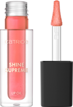 Catrice Shine Supreme Lip Oil w przezroczystej butelce z koralowym odcieniem i aplikatorem obok. Błyszczące wykończenie.