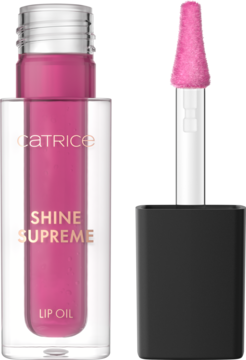 Catrice Shine Supreme Lip Oil w przezroczystej butelce z różowym płynem i złotym napisem, obok puszysty aplikator.