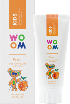 Biała tuba i pudełko pasty WOOM KIDS Peach 3-8 lat, z przodu, z rysunkiem koali z brzoskwinią.