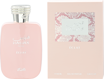 Różowa woda perfumowana Hajian Eclat, butelka z srebrnym korkiem i pudełko z wzorzystą etykietą, widok z przodu.