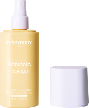 Żółty spray Everybody Banana Cream Body Moisturizing Mist z białą nakrętką obok, widok z przodu.