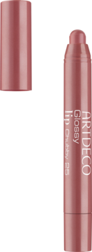 Artdeco Glossy Lip Chubby 25, otwarty kremowy błyszczyk w sztyfcie w kolorze brudnego różu, na dopasowanym tle.