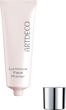 Rozświetlająca baza Artdeco Luminous Face Primer w jasnoróżowej tubce, obok srebrna zakrętka. Widok z przodu.