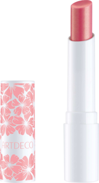 Otwarty balsam koloryzujący Artdeco Color Booster Lip Balm. Biała tubka, różowy sztyft i zakrętka z kwiatami.