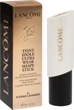 Lancôme Teint Idôle Ultra Wear Shape Stick 01 Flexing Lavender, biały rozświetlacz w sztyfcie obok złotego pudełka.