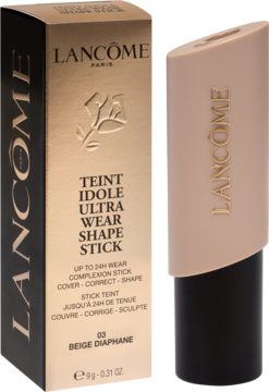 Lancôme Teint Idole Ultra Wear Shape Stick 03 Beige Diaphane, beżowy podkład w sztyfcie obok złotego pudełka.