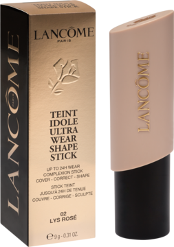 Lancôme Teint Idole Ultra Wear Shape Stick 02 Lys Rosé, beżowy podkład w sztyfcie obok złotego pudełka.