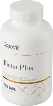 Biała butelka OstroVit Biotin Plus, suplementu diety na włosy i skórę, widok z przodu pod lekkim kątem.