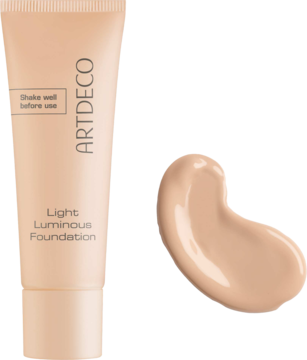 Artdeco Light Luminous Foundation, jasnobeżowa tubka i obok wyciśnięta porcja rozświetlającego podkładu.