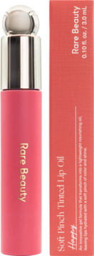 Rare Beauty Soft Pinch Tinted Lip Oil in Happy, vibrant pink tube and coral box with text, front view.