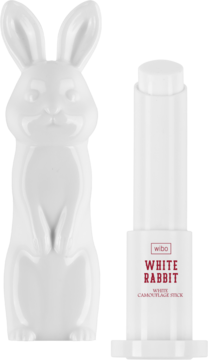 Biały stick Wibo White Rabbit do makijażu i charakteryzacji, obok ceramiczna figurka królika.