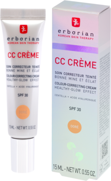 Biała tubka i pudełko Erborian CC Crème Doré SPF 30, widok z przodu na pastelowym tle.