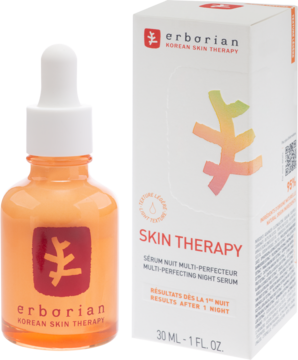 Erborian Skin Therapy nocne serum w pomarańczowej butelce z zakraplaczem i białym pudełkiem.