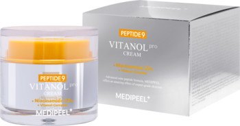 Krem Medi-Peel Peptide 9 Vitanol Pro w przezroczystym słoiczku z pomarańczową zakrętką, obok srebrne pudełko.