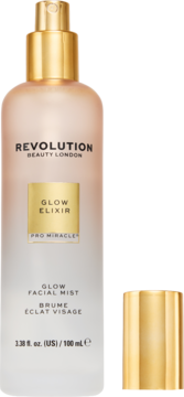 Revolution Glow Elixir mgiełka do twarzy 100ml, przezroczysta butelka ze złotym spryskiwaczem i nakrętką.