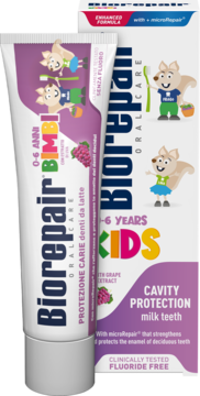 Biorepair Kids 0-6 lat, pasta do zębów bez fluoru, ochrona mleczaków. Tubka i pudełko z rysunkami, przód.