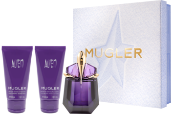 Zestaw Mugler Alien: fioletowa woda perfumowana, balsam i mleczko, przed białym pudełkiem prezentowym.