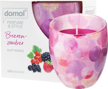 domol Beeren-zauber świeca zapachowa w słoiku z różowo-fioletowymi plamami. Obok białe pudełko z jagodami.