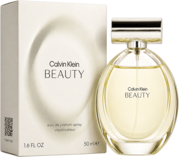 Calvin Klein Beauty, kwiatowa woda perfumowana. Owalna butelka ze złotym płynem, obok beżowe pudełko.