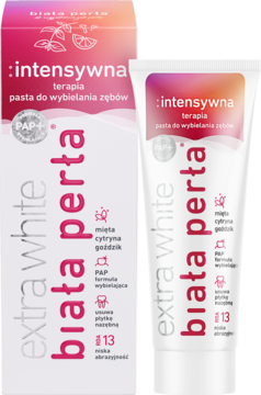 Pasta do zębów Biała Perła Extra White: różowy kartonik i biała tubka z PAP+, miętą i cytryną, widok z przodu.