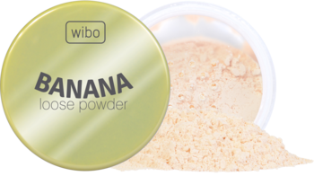 Okrągłe złote wieczko pudru Wibo Banana loose powder i obok otwarte opakowanie z wysypanym żółtym pudrem.