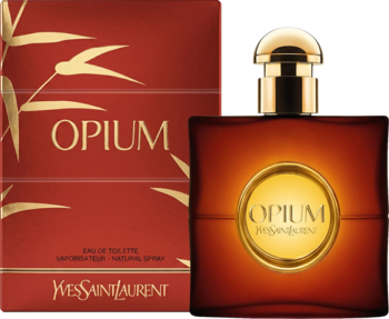 YSL Opium orientalna woda toaletowa w bursztynowej butelce z złotym korkiem, obok czerwonego pudełka z bambusem.