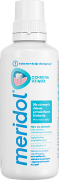 meridol Ochrona Dziąseł płyn do płukania ust. Biała butelka, niebieskie logo, grafika zębów i dziąseł.