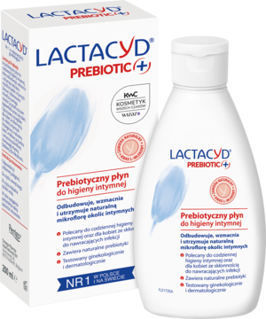 Biała butelka Lactacyd Prebiotic płynu do higieny intymnej i jej kartonik z niebieskim liściem, widok z przodu.