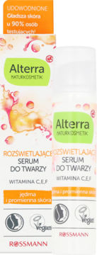 Białe butelki Alterra Rozświetlające Serum do Twarzy Witamina C,E,F (Rossmann) z zielonymi etykietami i grafiką.