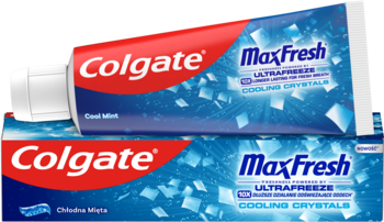 Pasta do zębów Colgate Max Fresh Cooling Crystals, niebieska tubka leży na pudełku, widoczne białe kryształki.