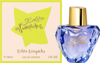 Lolita Lempicka EDP: flakon w kształcie serca z fioletowego szkła i różowe pudełko z zieloną gwiazdą.