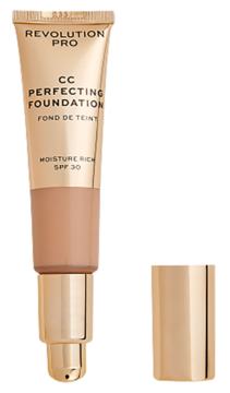 Podkład CC Revolution Pro Perfecting Foundation w beżowej tubce z SPF30, ze złotym dozownikiem, nakrętka obok.