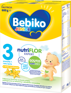 Bebiko Junior 3 mleko waniliowe NUTRIflor Expert w żółto-niebieskim kartonie, przód, dla dzieci pow. 1 roku.