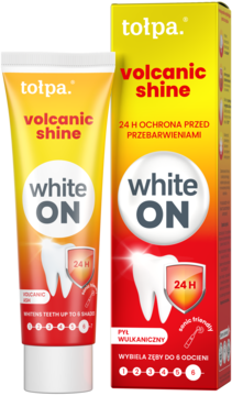 Tołpa Volcanic Shine White ON pasta wybielająca, tubka obok pudełka, żółto-pomarańczowa, chroni 24h, wybiela do 6 odcieni.