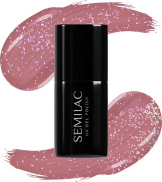 Lakier hybrydowy Semilac UV gel polish, butelka na tle karmelowego lakieru z brokatowym pyłkiem.