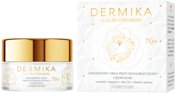 Ujędrniający krem Dermika Luxury Ceramides 70+ w białym słoiku obok pudełka ze złotym logo, widok z przodu.