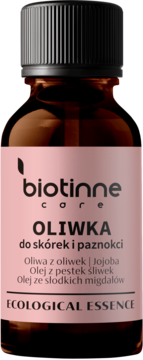 Oliwka Biotinne Core do skórek i paznokci, z olejem jojoba i migdałowym, w brązowej butelce, widok z przodu.